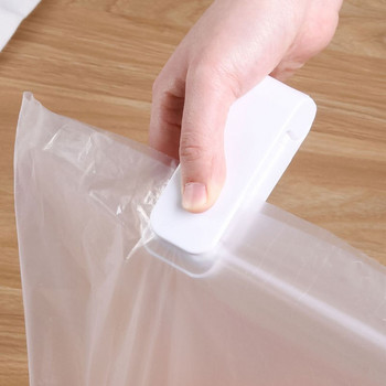 Мини щипка за запечатване на торбичка Битова преносима машина за запечатване на пластмасова торбичка за закуски Опаковка за храна Кухненска чанта за съхранение Довършителна скоба