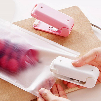 Мини щипка за запечатване на торбичка Битова преносима машина за запечатване на пластмасова торбичка за закуски Опаковка за храна Кухненска чанта за съхранение Довършителна скоба