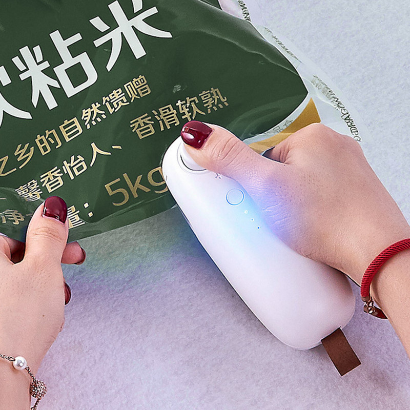 USB punjenje Stroj za brtvljenje Male kućanske grickalice Plastična vrećica Uređaj za ručno varenje pod pritiskom Prijenosni mini stroj za vakuumsko varenje