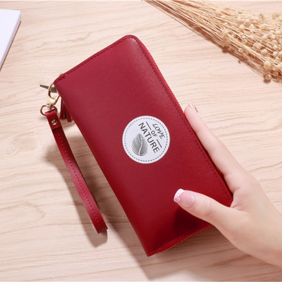 Portofel de dama cu ciucuri si maner de mana