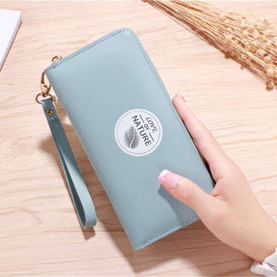 Portofel de dama cu ciucuri si maner de mana