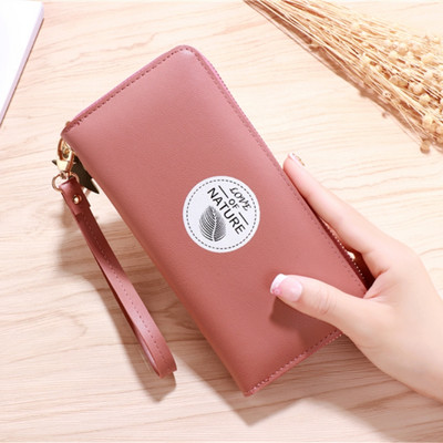 Portofel de dama cu ciucuri si maner de mana