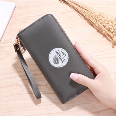 Portofel de dama cu ciucuri si maner de mana