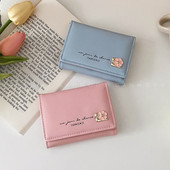 Portofel de dama in doua culori cu floare metalica