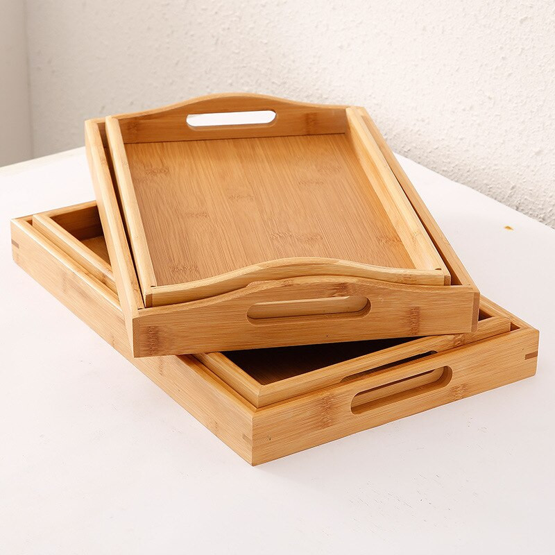 Obdĺžnikový bambusový čajový tácok, tácka na jedlo, občerstvenie, chlieb, káva, servírovací tácok, stôl, fľaše, šálky, úložný tanier, dekorácia do jedálne
