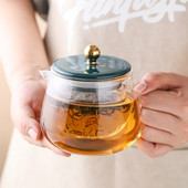 Háztartási magas hőmérsékletnek ellenálló üveg teáskanna tealefolyó szűrővel Teafőző átlátszó üveg délutáni teáskészlet
