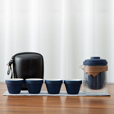 Keraminis kelioninis Kung Fu arbatos rinkinys Arbatos reikmenų rinkinys Kelioninis maišelis Vienas arbatinukas Keturi arbatinukai Porcelianinis stiklinis arbatinukas su puodelių rinkiniu Verslo dovana