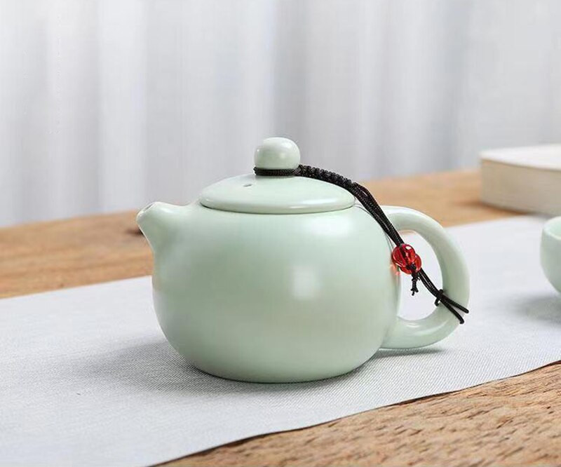 Creative Kung Fu Travel arbatos rinkinį sudaro 1 puodas ir 2 puodeliai Shu Puer arbatos indai Samovar keramikinis puodelis arbatinukas virduliai Yixing virdulio puodelis