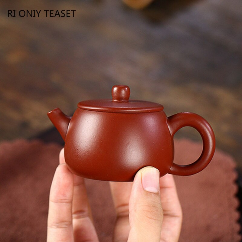 85 ml-es Yixing kézzel készített lila agyag teáskannák gömb alakú infúziós teáskanna szépség vízforraló testreszabott Zisha teáskészlet Dahongpao Authentic