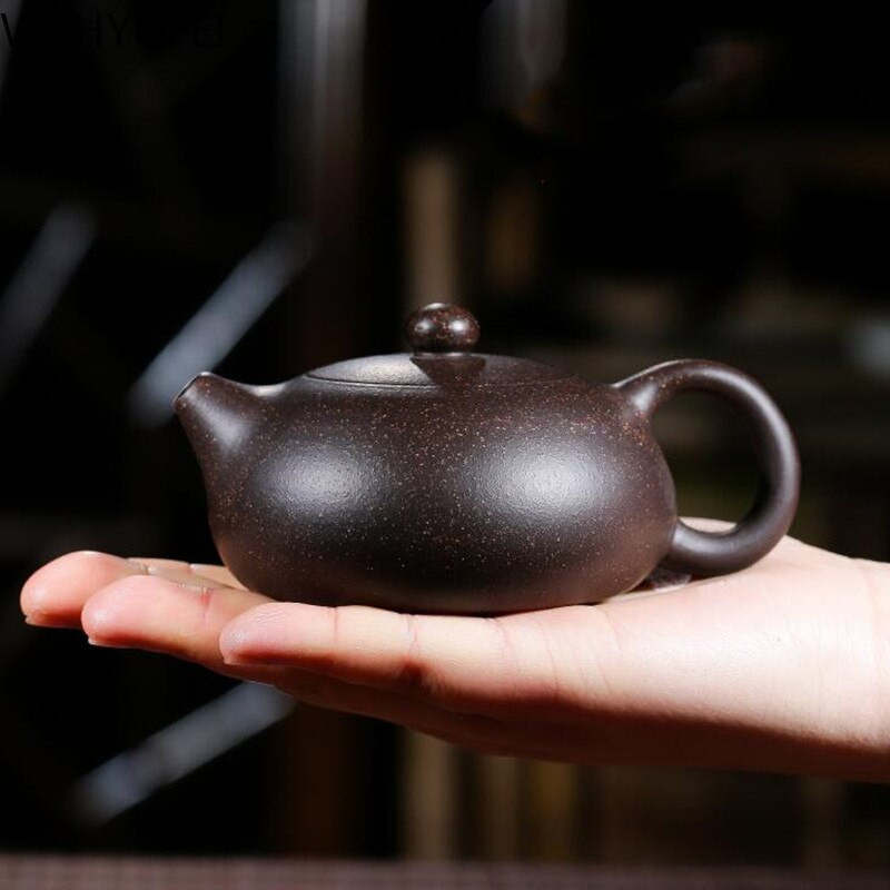 Kis űrtartalmú lila homokos teáskanna 150ml Minden kézzel készített golyós lyukas kungfu teáskészlet Xi Shi edény Sima víz Ivóeszközök WSHYUFEI