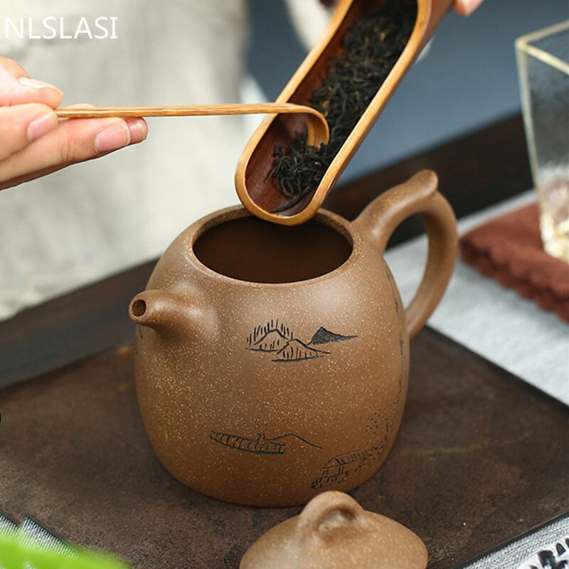 Kínai Yixing teáskanna teaszertartási kellékek Boutique Purple Clay Xishi teáskanna kézzel készített teaedény Ore Beauty Kettle Master 340 ml