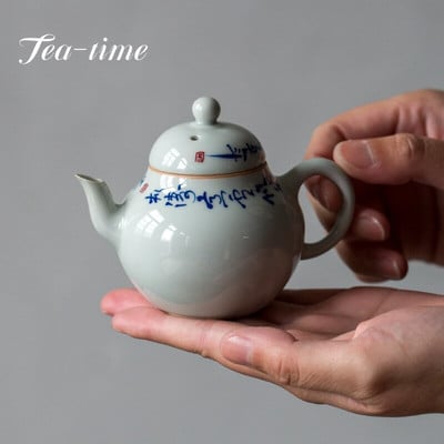 100 ml-es ősi kék mázas kék-fehér teáskanna kézzel írt Cursive Script Poetry Poetry edény szűrős teafőzővel, vízforraló Kungfu teaset