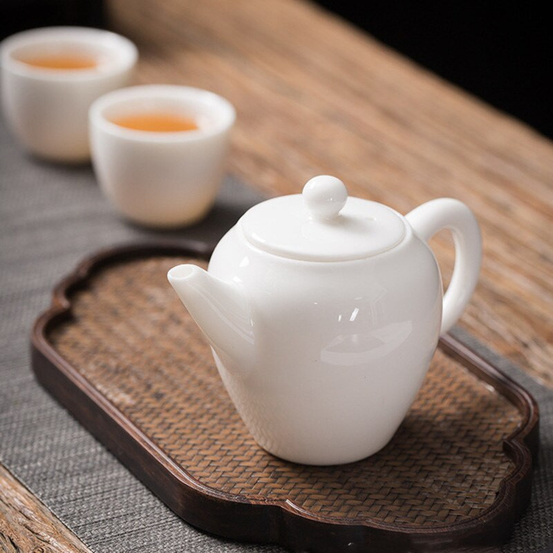 Kiniškas rankų darbo balto porceliano arbatinukas dramblio kaulo baltumo arbatinukas keramika Arbatos indas arbatos infuzinis Pu'er Oolong arbatos filtro virdulys