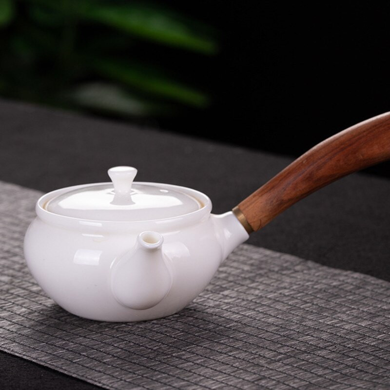 Kiniškas rankų darbo balto porceliano arbatinukas dramblio kaulo baltumo arbatinukas keramika Arbatos indas arbatos infuzinis Pu'er Oolong arbatos filtro virdulys