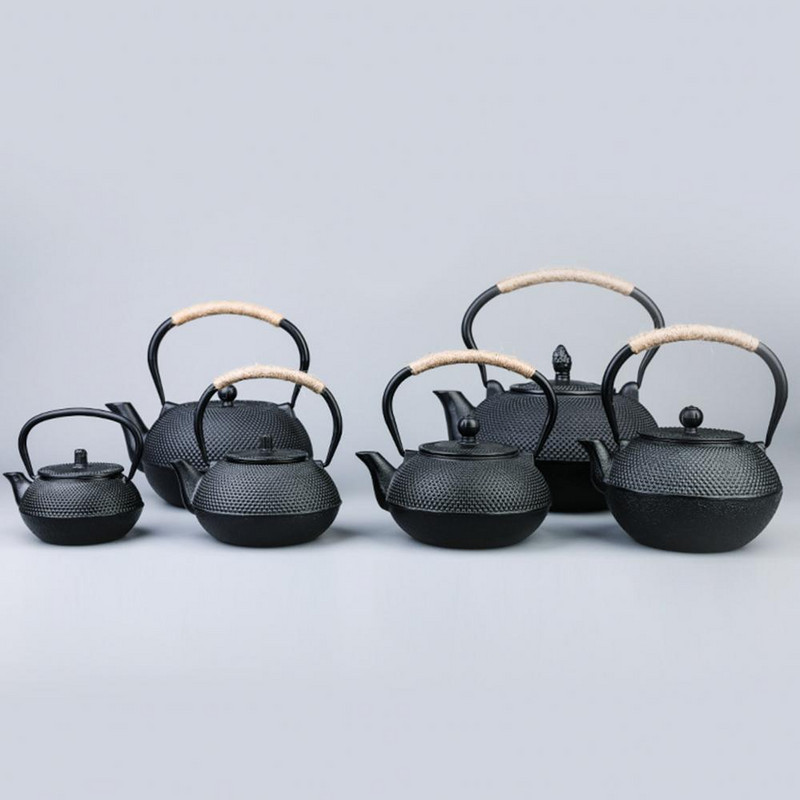 Tradicinio kinų stiliaus arbatos puodo karščiui atsparūs geležiniai arbatinukai su nerūdijančio plieno infuzoriumi Lieta arbatos virimo aparatas.