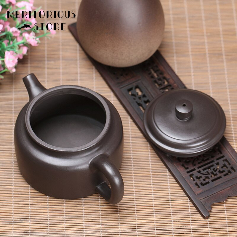 Ceainic din lut violet Yixing chinezesc Oală lucrată manual Minereu Ceainic cu noroi negru Zisha ceainic Suit Tie Guanyin Puer Ustensile de ceai de uz casnic 250 ml