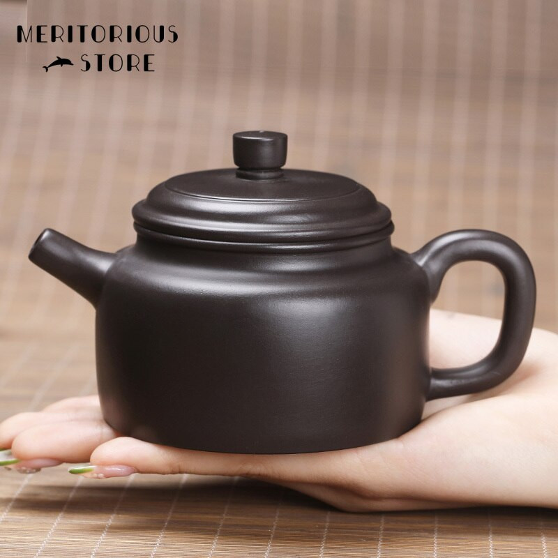 Ceainic din lut violet Yixing chinezesc Oală lucrată manual Minereu Ceainic cu noroi negru Zisha ceainic Suit Tie Guanyin Puer Ustensile de ceai de uz casnic 250 ml