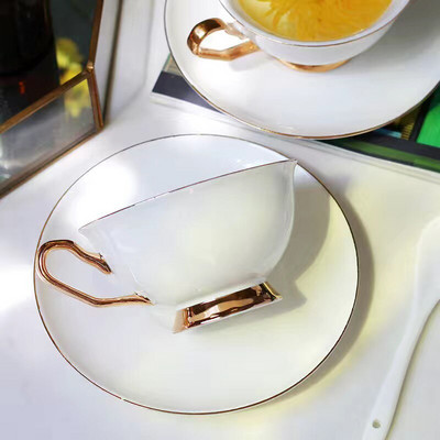 Wourmth augstas kvalitātes kaula porcelāna kafijas krūzes ar zelta rokturi Keramikas uz glazūra uzlabotas tējas krūzes un apakštasīšu komplekti luksusa dāvana