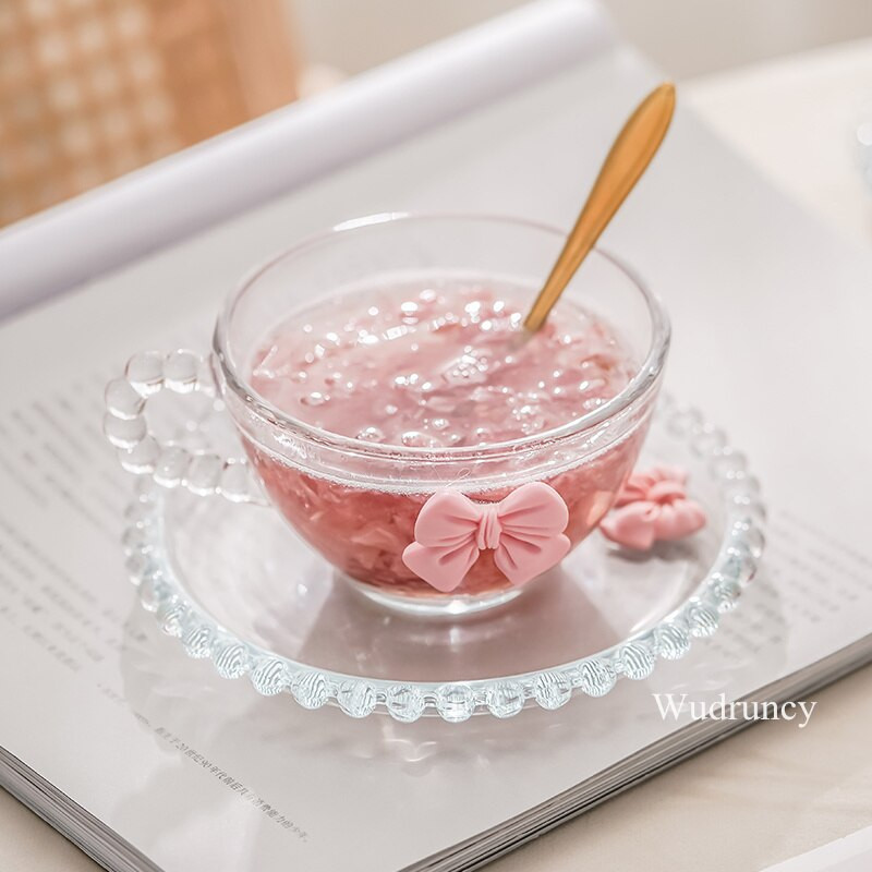 Wudruncy gyöngyös üveg teáscsésze és csészealj Girly Pink Bow átlátszó üveg kávéscsésze csészealj magas lábú desszert csésze kanállal