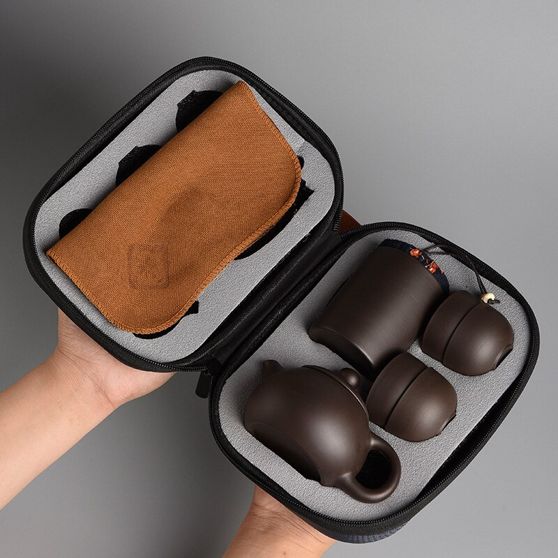 Nešiojamas kelioninis arbatos rinkinys Purpurinio molio Kung Fu arbatos rinkinys Kinijos porcelianinis Zisha arbatos puodelis 4 puodeliai arbatos puodelis Rankų darbo gėrimų rinkinys