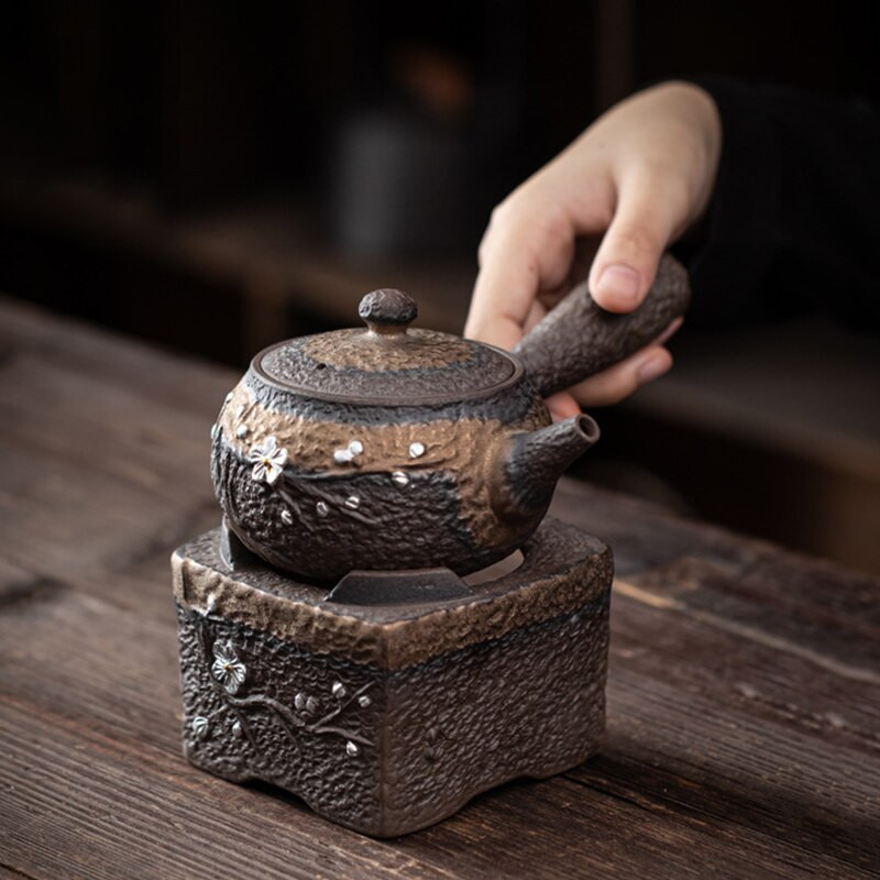 Senovinė arbatos ugnies krosnelė Sidabrinė gėlių dekoracija Kūrybinės viryklės Arbatos ceremonijos priedai Šiltesnis keraminis žvakių šildytuvas Naktinės šviesos menas