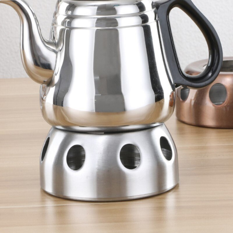 Nerūdijančio plieno alkoholinės viryklės arbatinuko pagrindas lauke, nedidelis karštas puodas, nešiojamasis praktiškas alkoholio ugnies katilo pagrindas arbatinuko padėkliukų išpardavimas