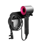 Seinale kinnitatav hoidik Dyson Supersonic föönile, isekleepuv seinale riputatav toitepistik.