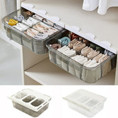 Drabužių spinta Pakabinama apatinių drabužių laikymo dėžė po rašomuoju stalčiumi.