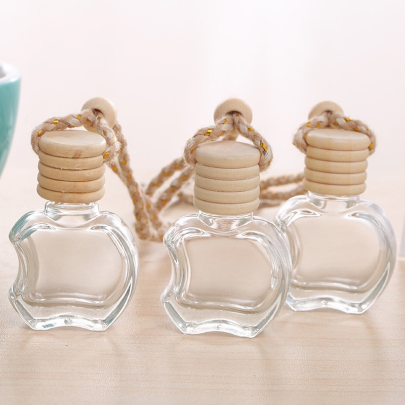 10 vnt. Automobilyje pakabinamas stiklinis butelis, tuščias kvepalų aromaterapinis dozatorius, pripildomas eterinių aliejų difuzorius, oro gaivinimo pakabukas X7XD