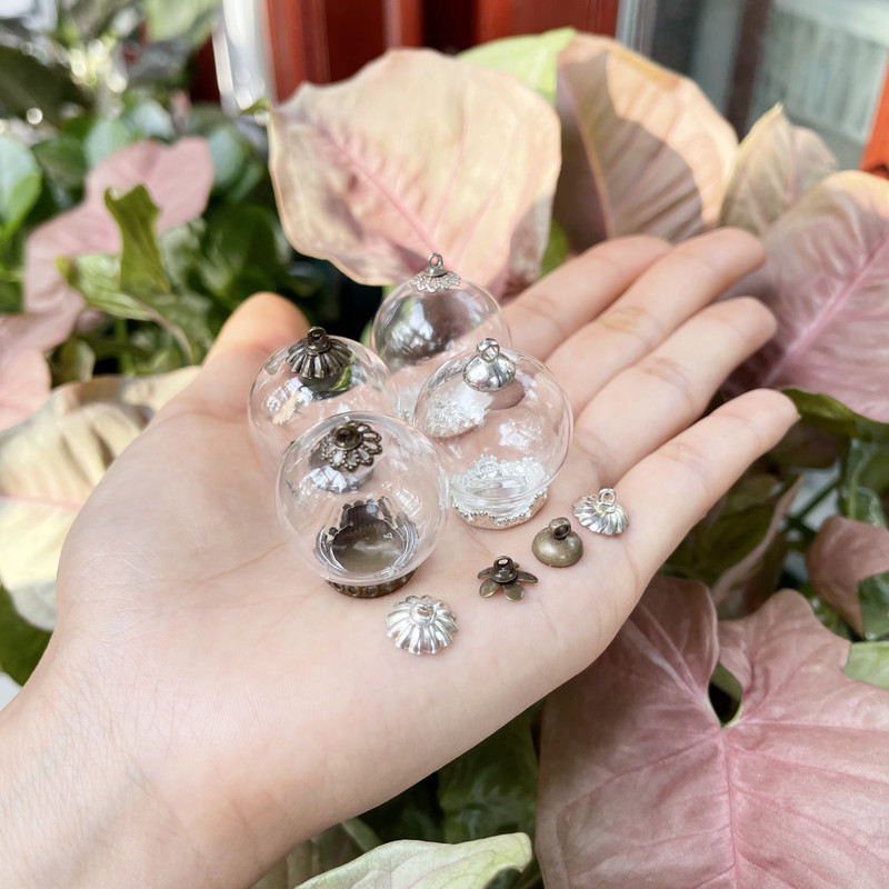 10X 25x15 mm-es üreges üveggömb alapsapkával üveg fiola függő barkácsüveg palack kupola fedél nyaklánc kulcstartó bűvész dekoráció