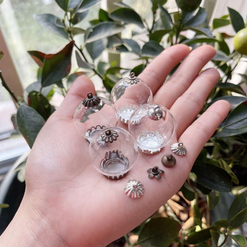 10X 25x15 mm-es üreges üveggömb alapsapkával üveg fiola függő barkácsüveg palack kupola fedél nyaklánc kulcstartó bűvész dekoráció