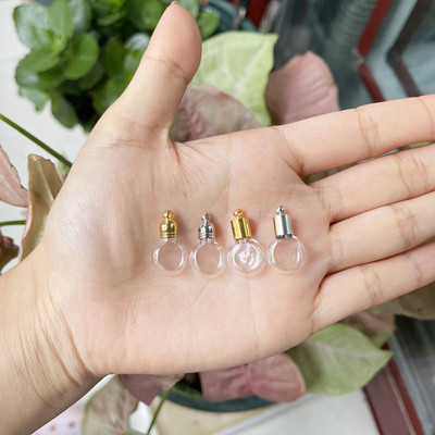 8X Mix Stílusú üvegfiola medál Mini Parfüm Olaj Palack Bűbáj Rizs Fiolák Ragasztós Kupak Nyaklánc Charms DIY Név a Rice Art ékszereken