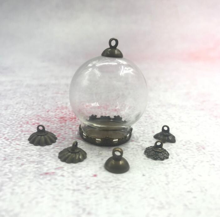 5db/tétel 30x20m Kerek gömbölyű üveggömb bronz/ezüst/arany színű virágalappal és kupakkal üveg fiola palack kupola medál dekorral