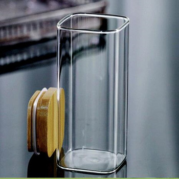 2τμχ/συσκευασία Διάμετρος=6cm Διαφανές γυάλινο δοχείο τσαγιού υψηλής περιεκτικότητας σε βοριοπυριτικό δοχείο αποθήκευσης Δεξαμενή αποθήκευσης Προστασία περιβάλλοντος Σφραγισμένο κάλυμμα μπαμπού κατσαρόλας
