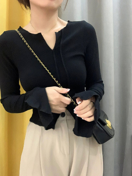 Γυναικείο μονόχρωμο μακρυμάνικο πουλόβερ με λαιμόκοψη V