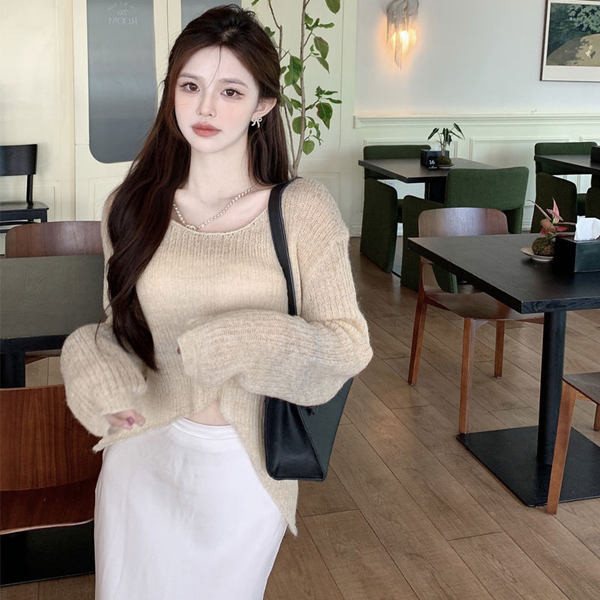 Φαρδύ μοντέλο γυναικείο πουλόβερ με οβάλ λαιμόκοψη και μακριά μανίκια