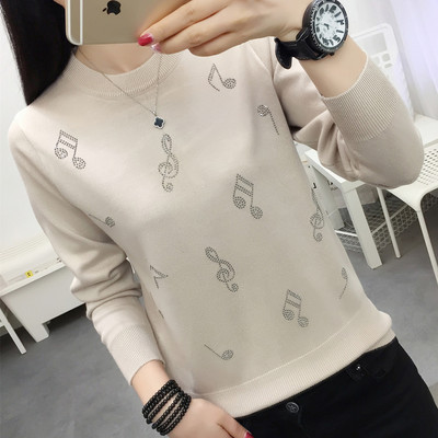 Ženska bluza s ovalnim izrezom i kamenčićima