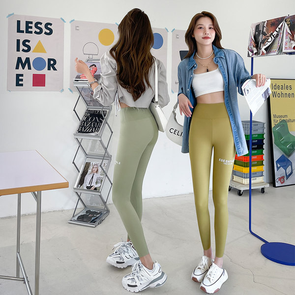 Női magas derekú elasztikus sportlegging felirattal