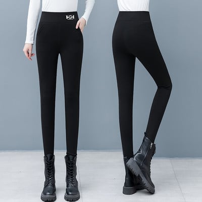 Moteriškos vienspalvės antblauzdžiai su logotipu