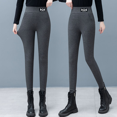 Moteriškos vienspalvės antblauzdžiai su logotipu