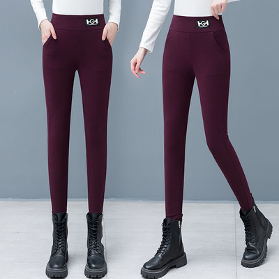 Moteriškos vienspalvės antblauzdžiai su logotipu