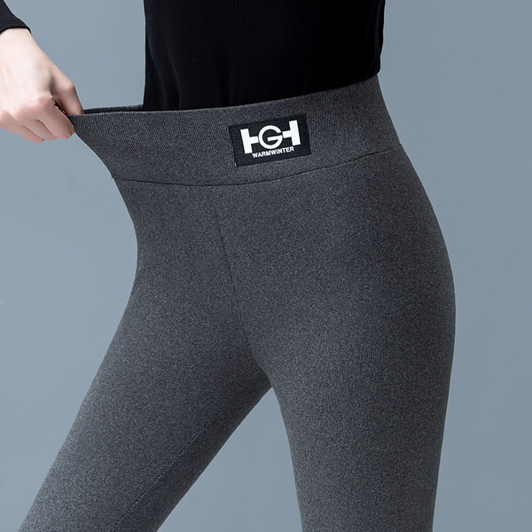 Moteriškos vienspalvės antblauzdžiai su logotipu