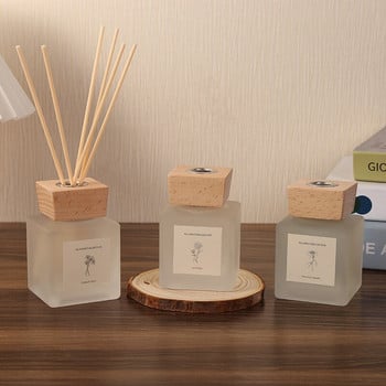 50ml Φυτικό αιθέριο έλαιο Reed Diffuser Frosted Aroma Diffuser Bottle με ξύλινο καπάκι και φυσικά μπαστούνια από ρατάν για διακόσμηση σπιτιού