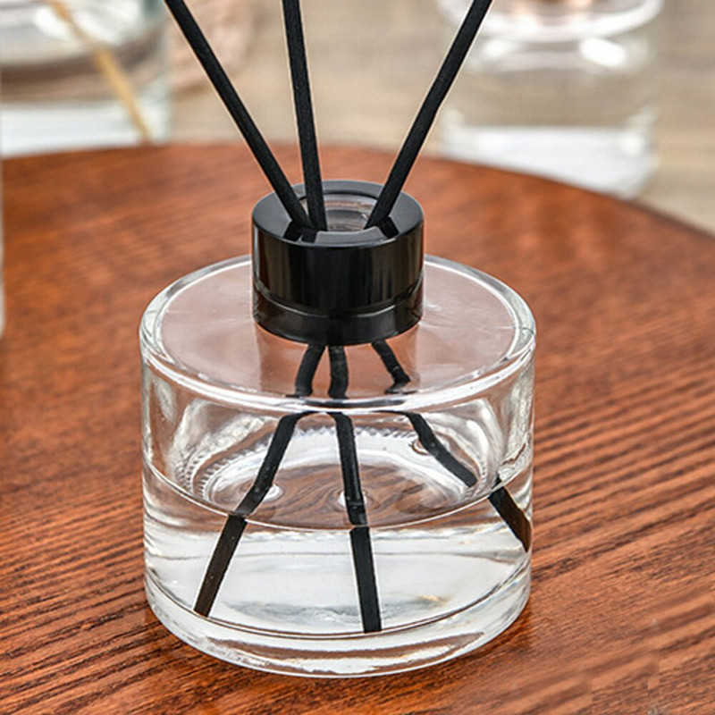 100 ml ir 200 ml tuščios apvalios formos Kvapinio stiklo difuzoriaus buteliukas ir Aromaterapijos buteliukai su aliumito apskritimu ir plastikiniais dangteliais