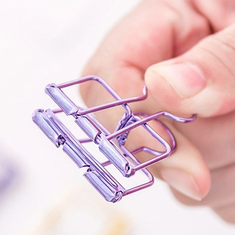 Paprastas metalinis tuščiavidurio uodegos sąvaržos sąvaržos laikiklis biuro rankos sąskaitos spalvos ilgas uodegos segtukas Studento bandomojo popieriaus laikiklis