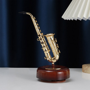Музикална кутия за саксофон Класическа навиваща се въртяща се музикална кутия Въртяща се основа Месингов духов инструмент Миниатюрен подарък за изкуство