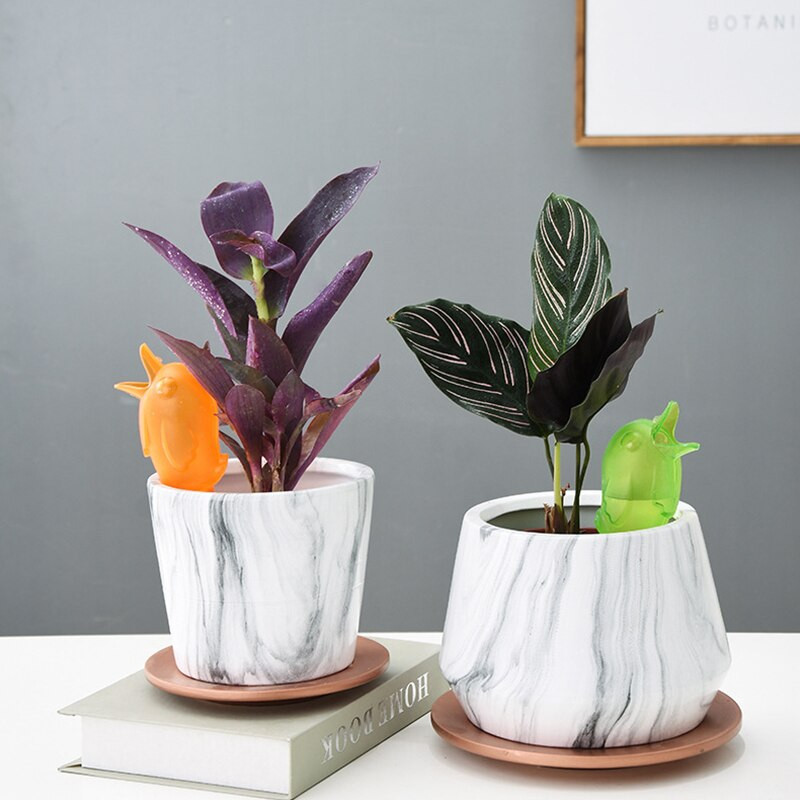 Aia automaatne kastmistööriist Armsate lindude kujuga tilgakastmissüsteem kastmissüsteem potis läbipaistev taim Lillejootmise tilguti