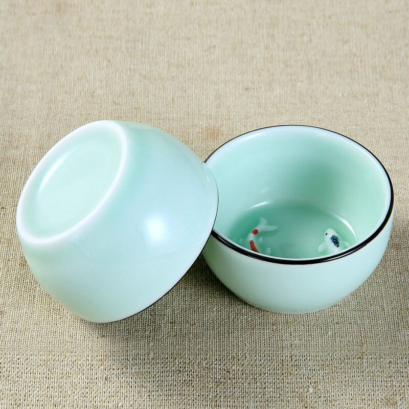 80 ml-es Celadon Kínai teáscsésze zöld/kék, kézzel festett, dombornyomott Halak csésze Jingdezhen Kaolin Kerámia Pu'er Teáscsésze Nagyker