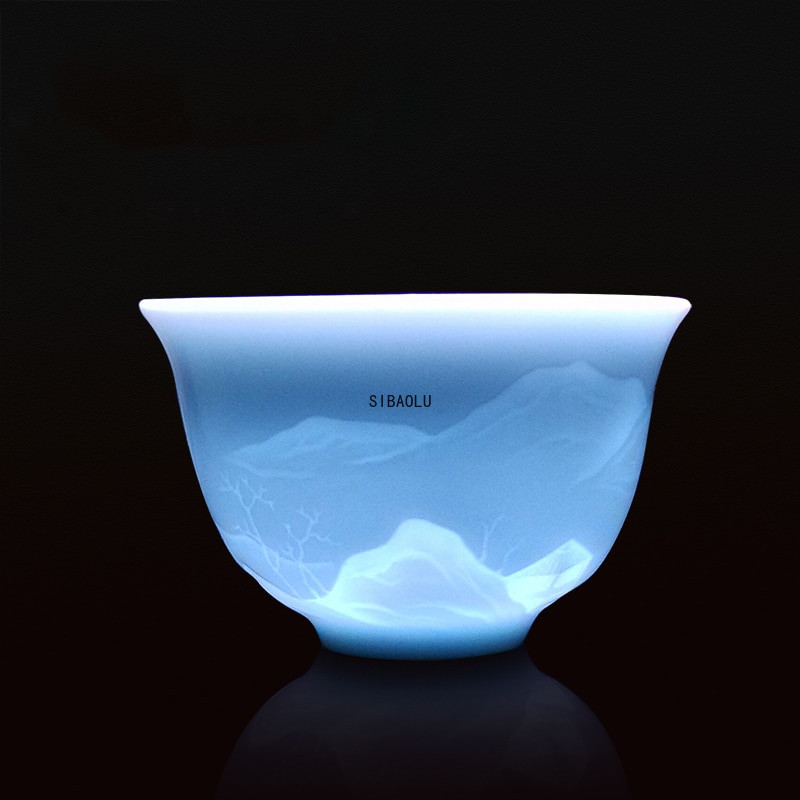 Kézzel készített kék-fehér porcelán árnyékkék faragott láthatatlan lótusz mintás teáscsésze mester csésze teáscsésze kerámia