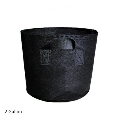 Nem szőtt faszövet edények termesztő táska gyökértartály. Fekete kéz növény ültetési virágokkal nemszőtt zacskók Növekszik kultúra